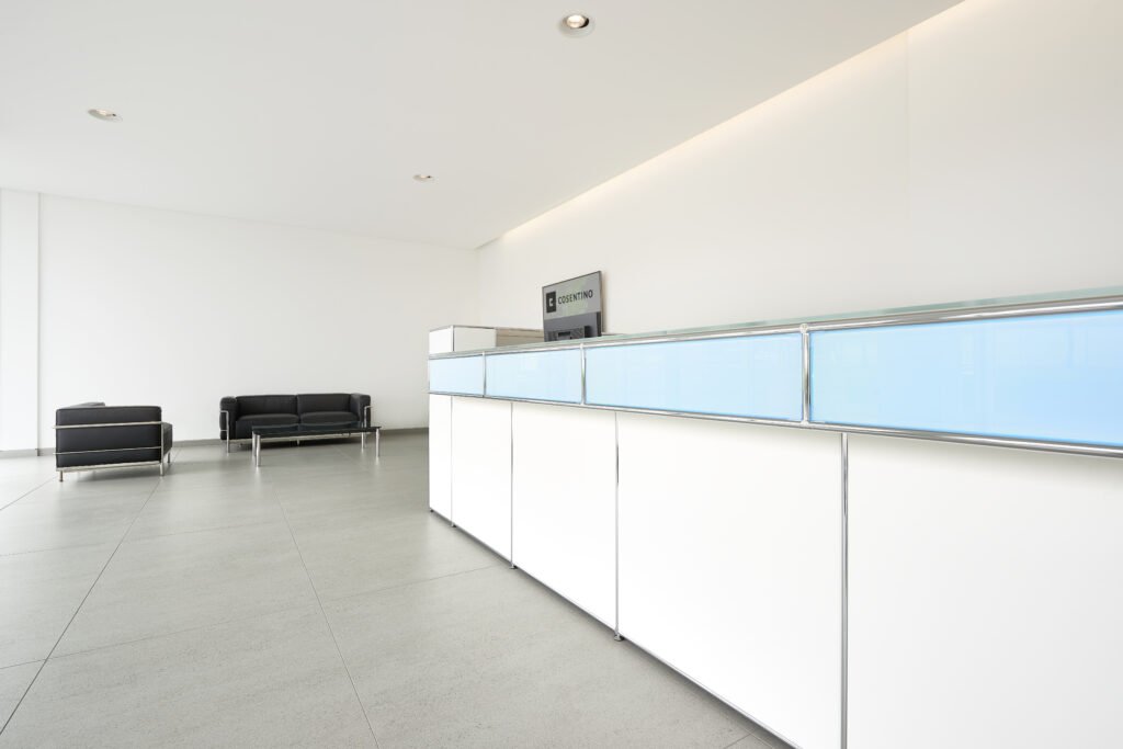 A stark office area with stone work