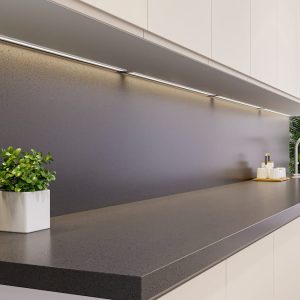 A close up of a sleek kitchen in modern grey stone