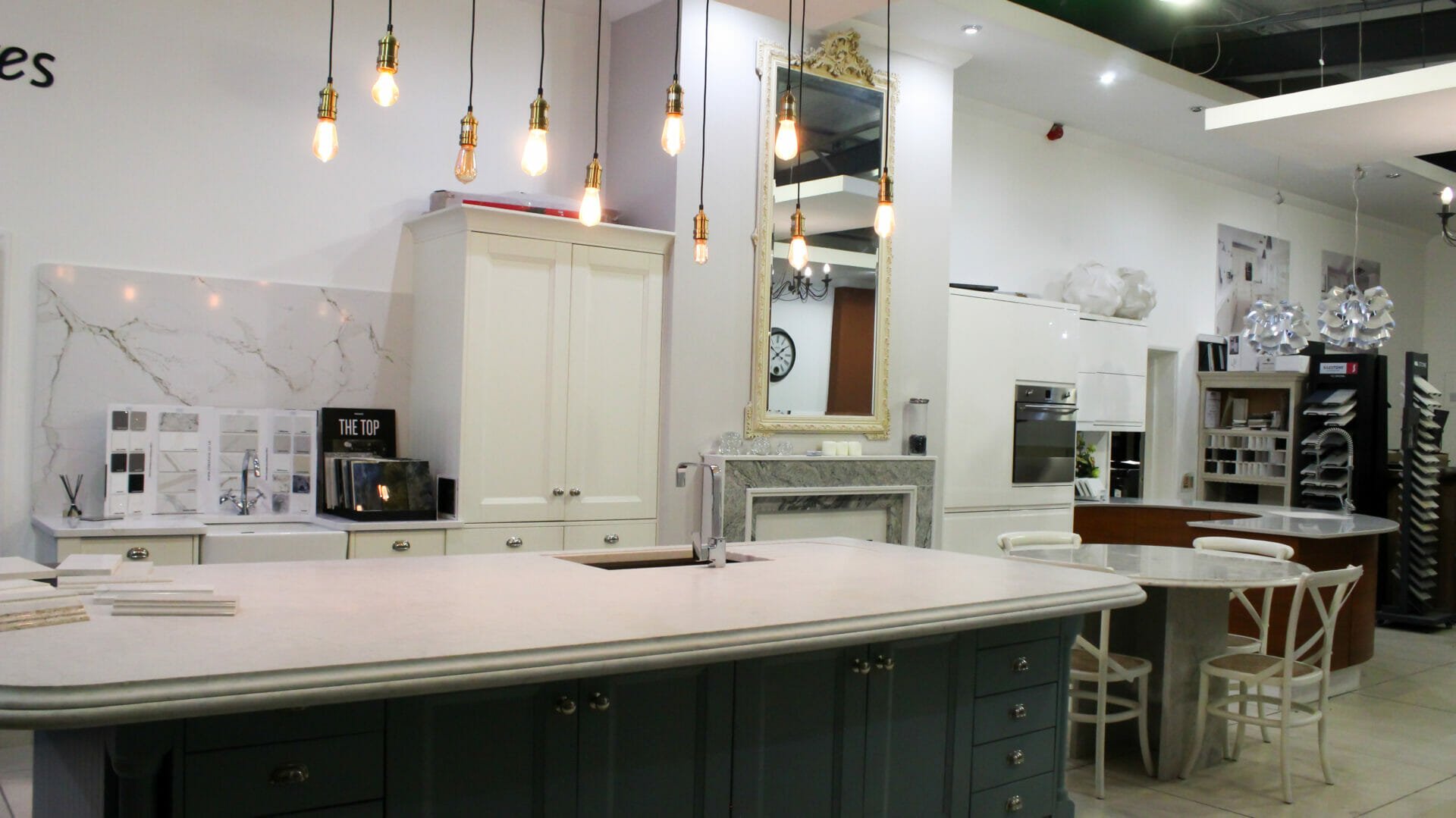A kitchen worktop and hanging lights in Paramount's showroom