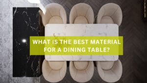 A white stone look dining table with six chairs.